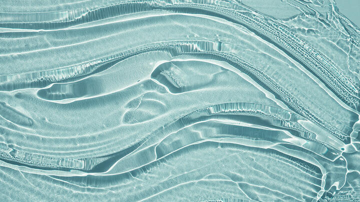 Transparent gel on a turquoise surface